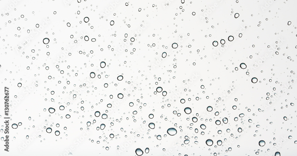 clean round water drops on transparent glass clean round water drops on transparent glass
