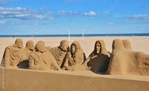 Beautiful large sand sculpture  on Malvarrosa beach in Valencia, Spain