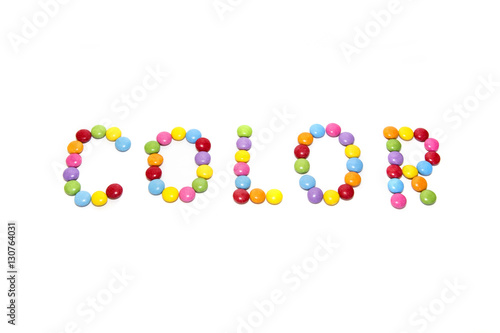 Word ''Color'' made from multicolored sweets candy