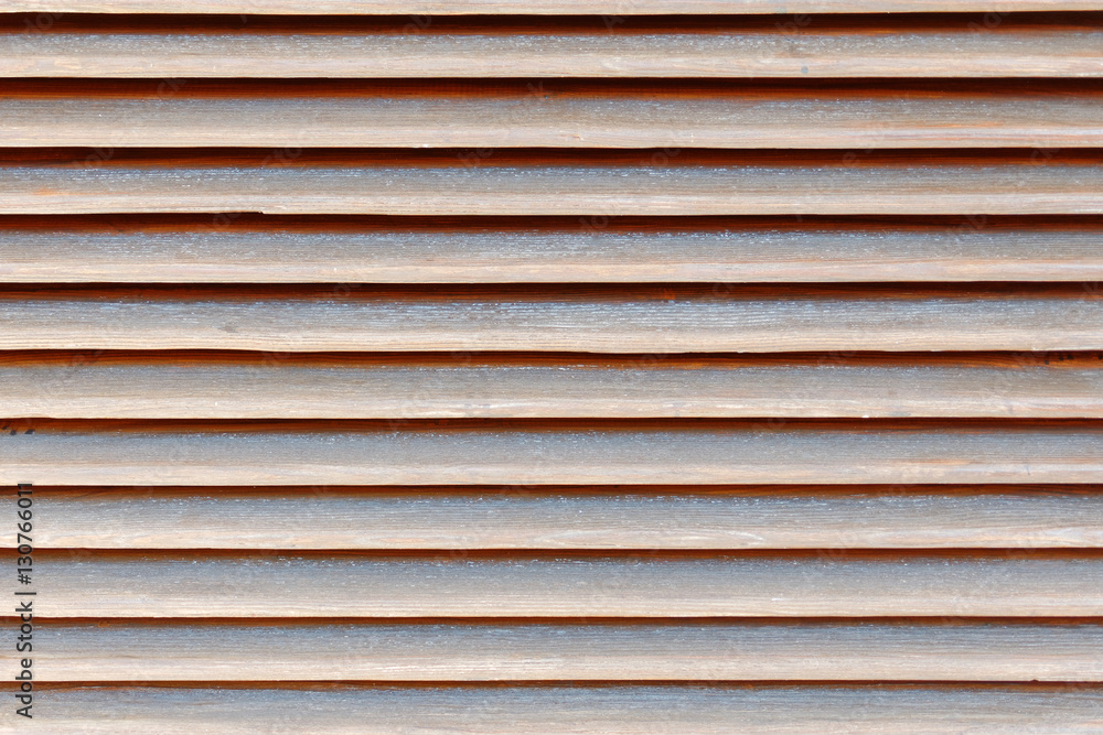 brown shutters closeup, wood background