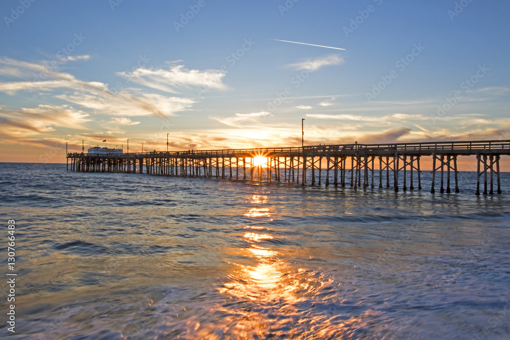 Fototapeta premium Beach sunset at Newport Beach, California during winter