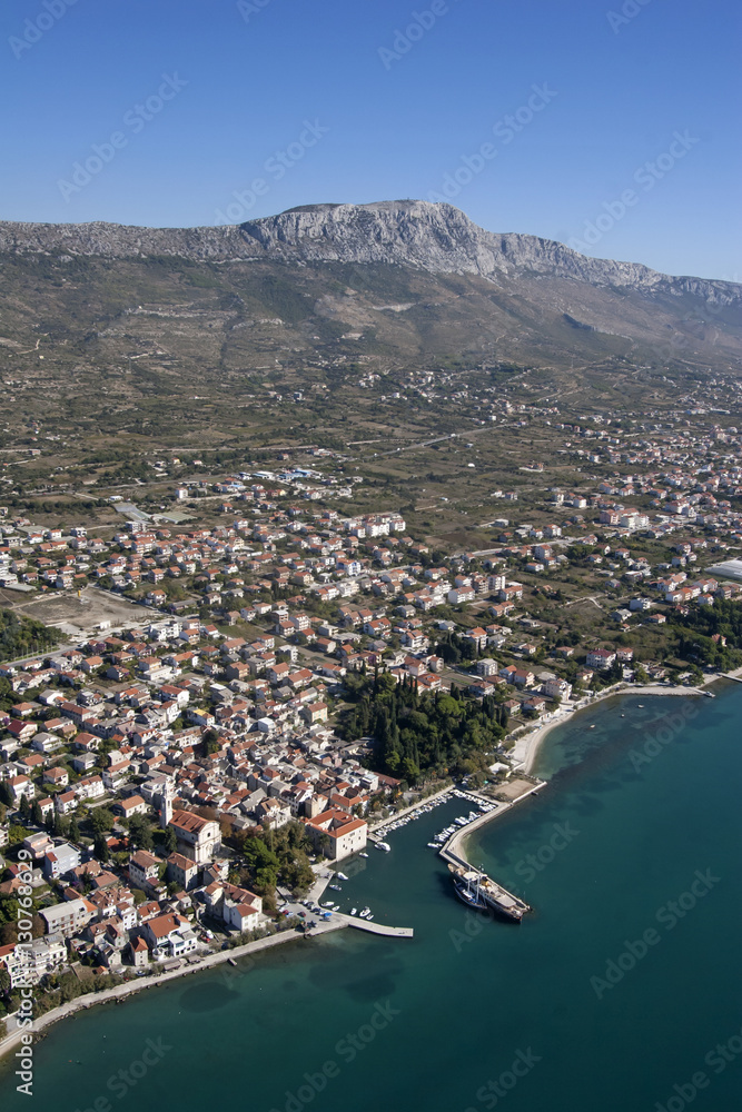 Kastel Luksic, one of seven settlements in Kastel Bay, at the foot of the hill Kozjak on Adriatic coast in Croatia