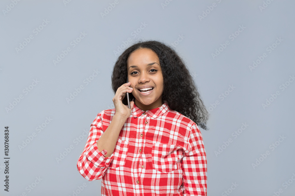 Young Woman Using Cell Smart Phone Talking Call African American Girl Happy Smile Chatting Online Isolated Over Gray Background Young Woman Using Cell Smart Phone Talking Call African American Girl Happy Smile Chatting Online Isolated Over Gray Background