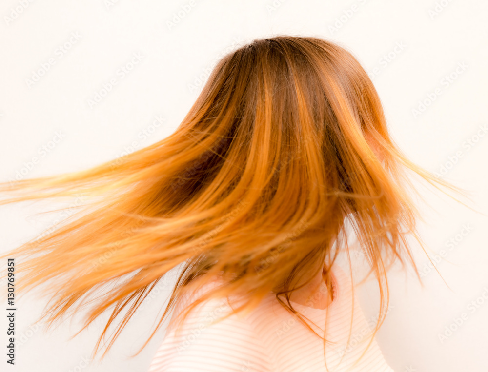 Young beautiful girl with red hair flying Young beautiful girl with red hair flying