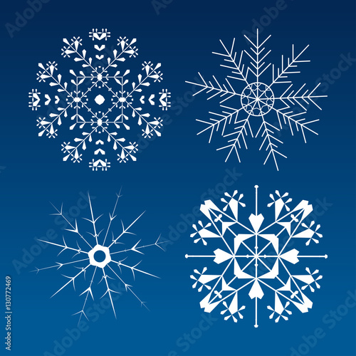 Set of white vector snowflakes on the gradient blue background.