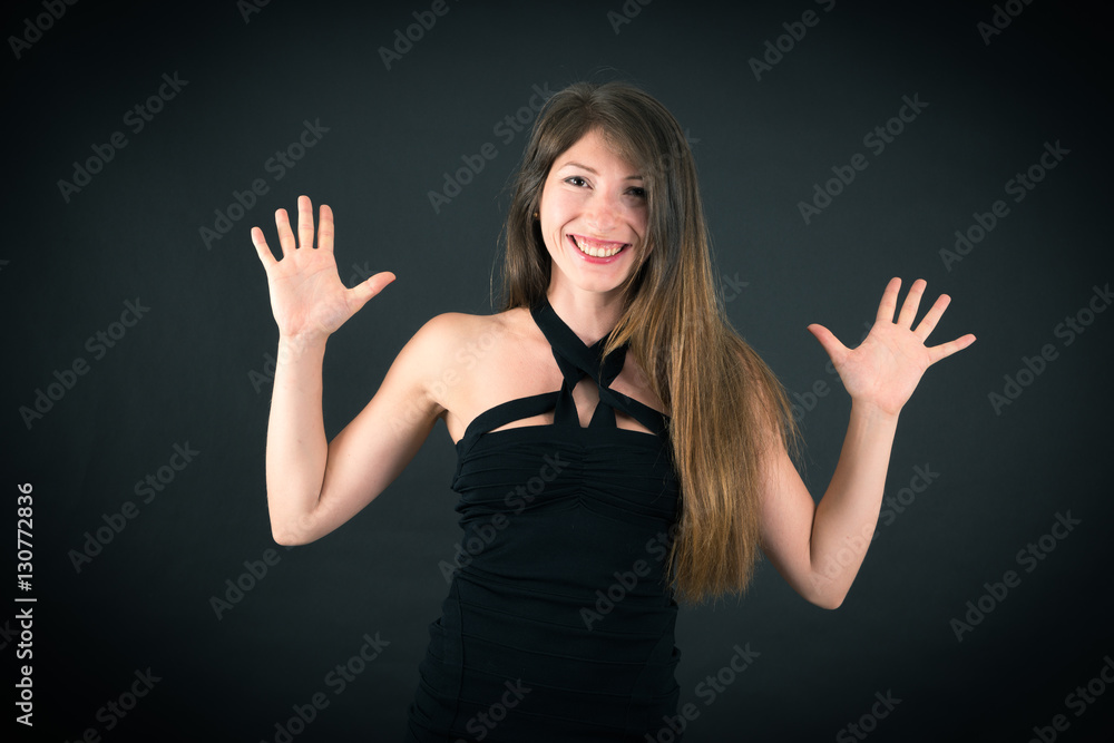 Beautiful woman doing different expressions in different sets of clothes: joy Beautiful woman doing different expressions in different sets of clothes: joy