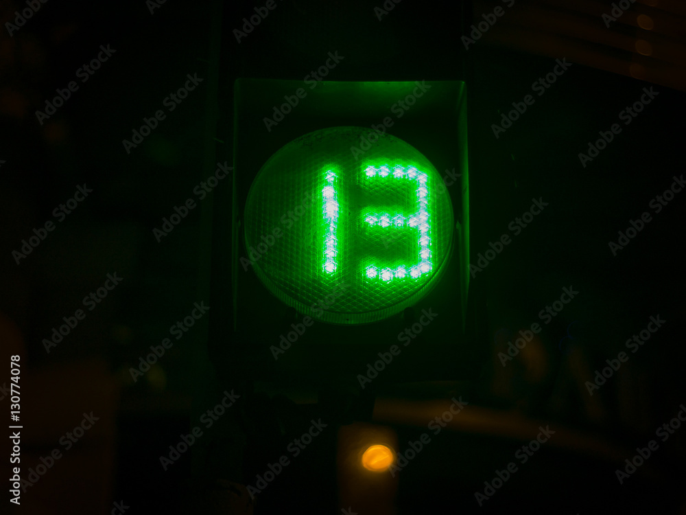 Street light numbers in the night. Low light photo. Street light numbers in the night. Low light photo.