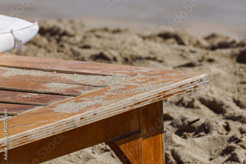 deckchairs detail on the beach . close up photo .