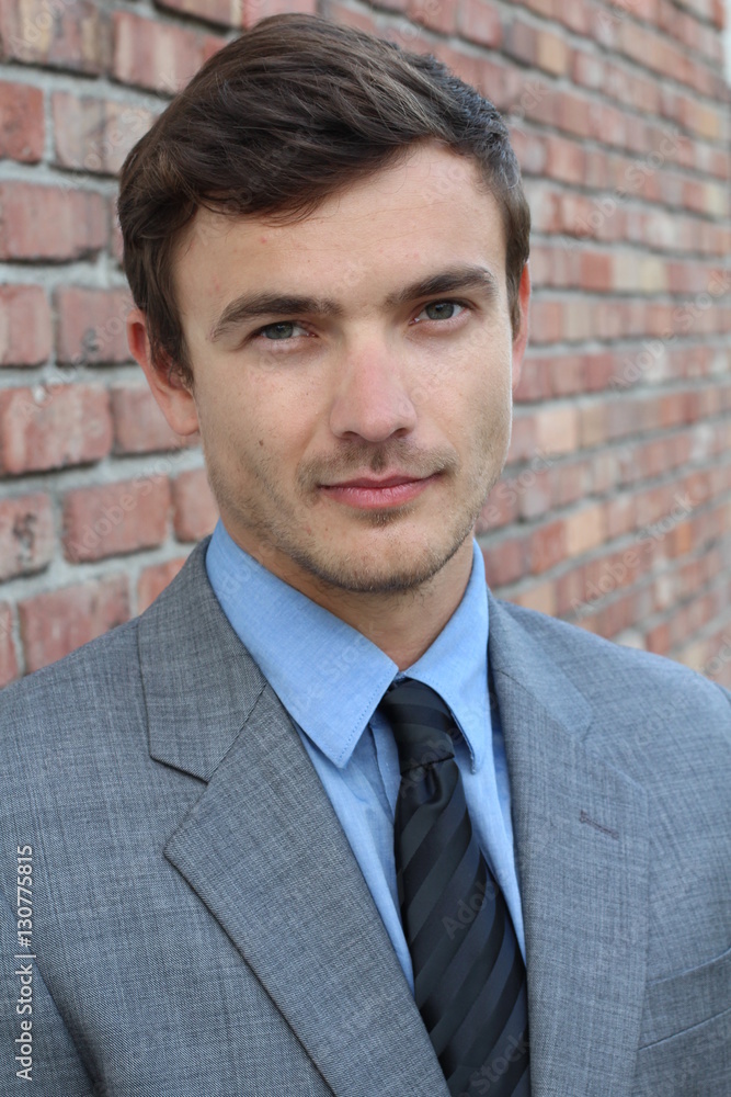 Man gracefully wearing a suit Man gracefully wearing a suit