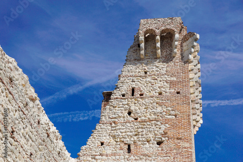 ruins of old medieval castle . fortified wall and tower detail brick
