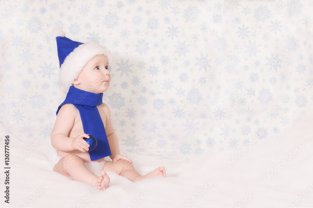 the child in a the snowman costume is against the backdrop of sn the child in a the snowman costume is against the backdrop of sn