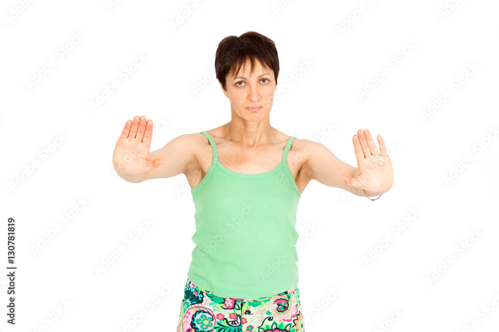 Beautiful woman doing different expressions in different sets of clothes: stop sign Beautiful woman doing different expressions in different sets of clothes: stop sign