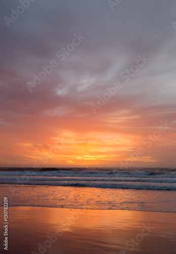 Portrait view of Sunrise with cloudy skies © porqueno
