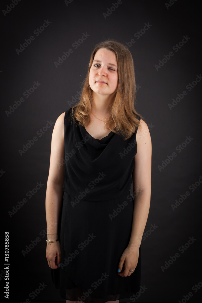 Beautiful woman doing different expressions in different sets of clothes: wink Beautiful woman doing different expressions in different sets of clothes: wink