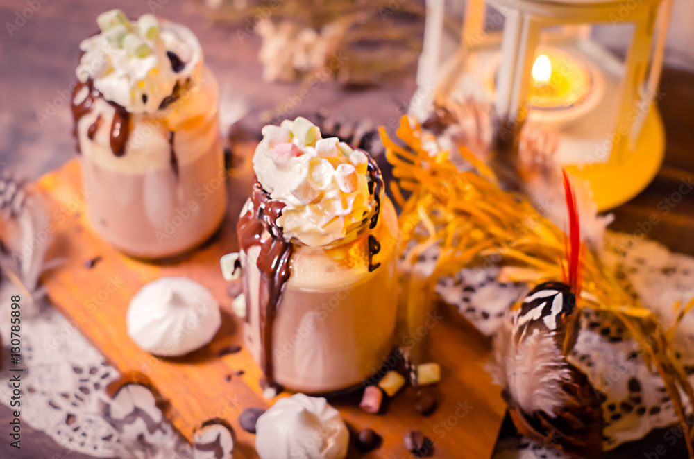 Decorative scene with cocoa, coffee, marshmallow