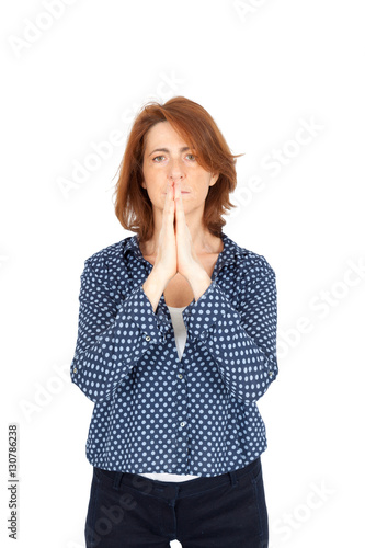 Beautiful woman doing different expressions in different sets of clothes: prayer