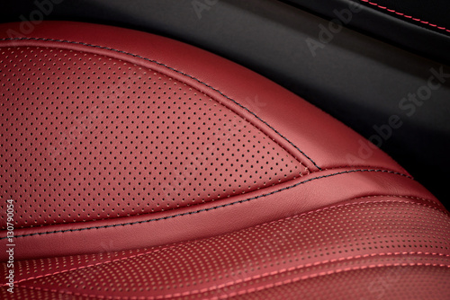 Car interior background. Part of leather seat. Macro. © alexdemeshko