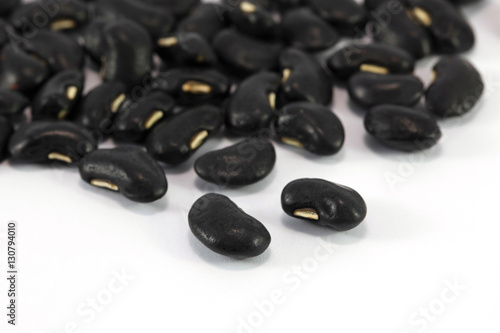 a lot of black bean on white background