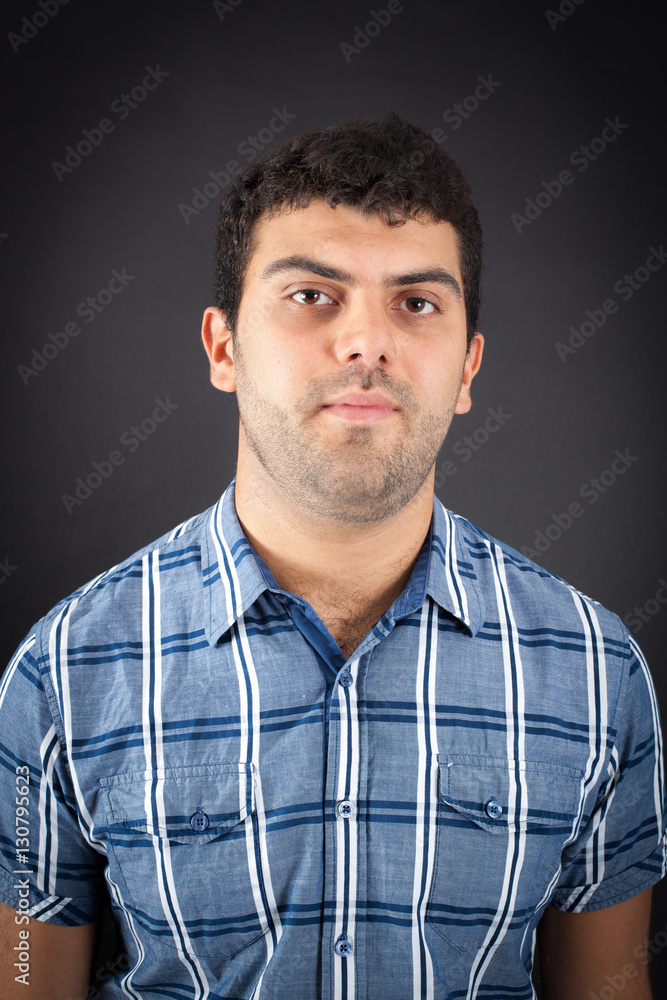 Fototapeta premium Handsome man doing different expressions in different sets of clothes: thinking