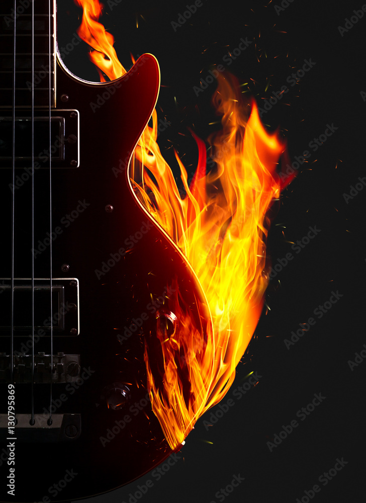 Obraz premium Electronic bass guitar on fire.
