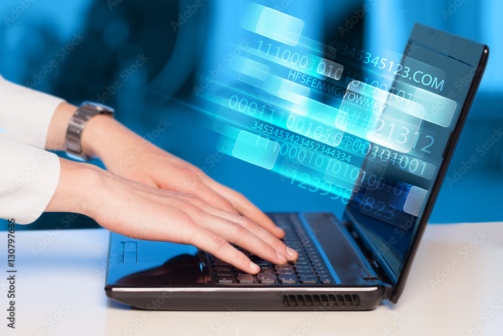 Close up of man typing on laptop computer Close up of man typing on laptop computer