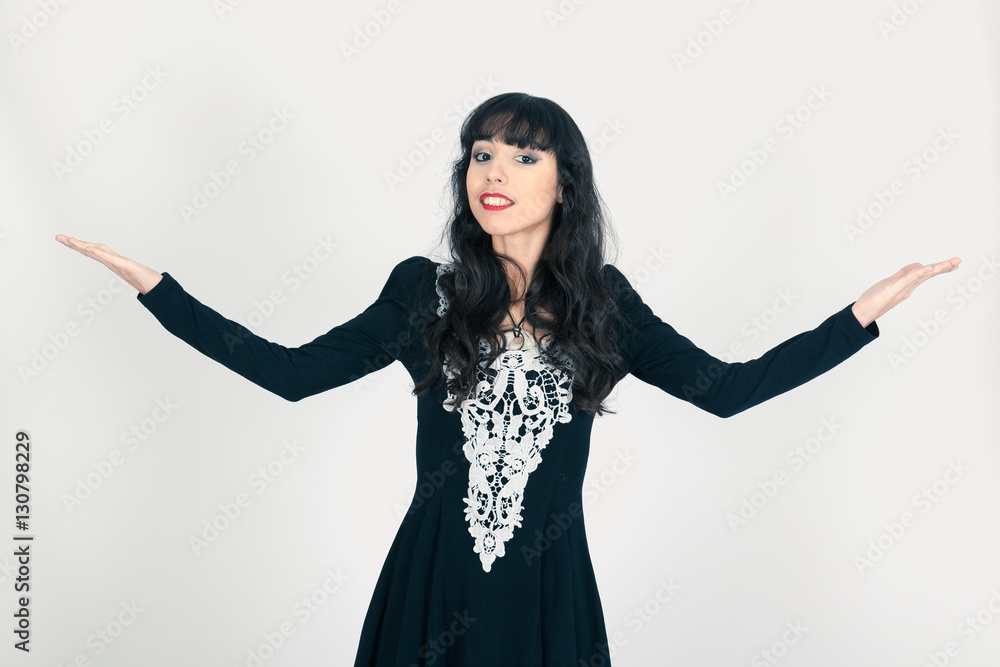 Beautiful woman doing different expressions in different sets of clothes: welcome Beautiful woman doing different expressions in different sets of clothes: welcome