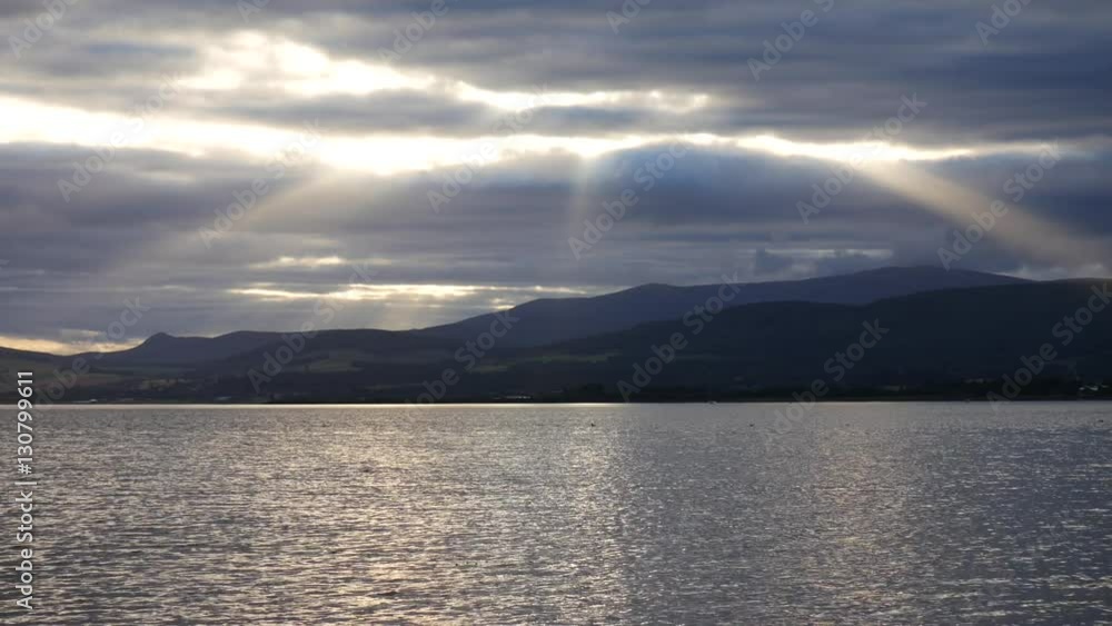 Sun beams (ray of light) to mountains during sunset at Invergordon, Scotland, UK
Sun beams (ray of light) to mountains during sunset at Invergordon, Scotland, UK