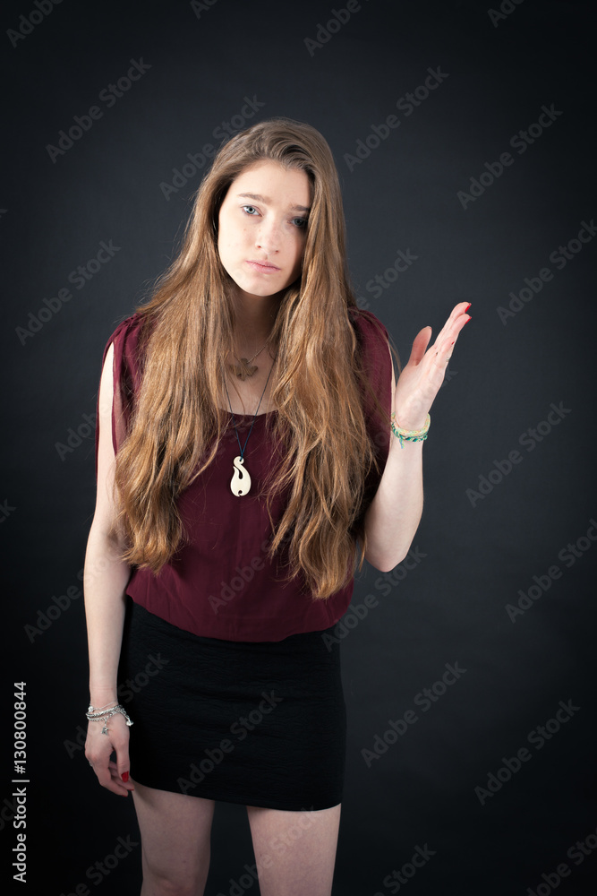 Beautiful woman doing different expressions in different sets of clothes: be careful Beautiful woman doing different expressions in different sets of clothes: be careful