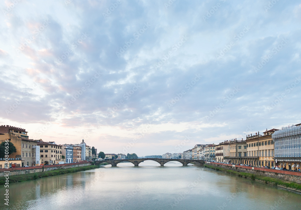blue sunset clouds over Arno River in Florence
