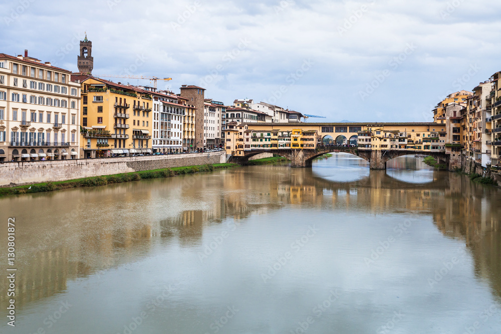 view of Ponte Vecchio over Arno river in autumn