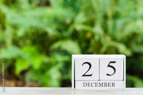 December 25th.Christmas's day.Cube calendar on wooden table.