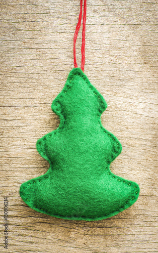 Christmas tree on wooden background
