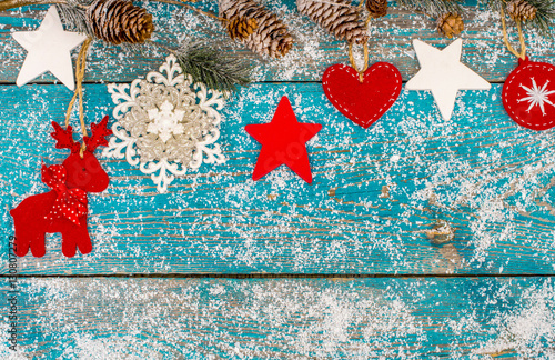Christmas decoration hanging over wooden background