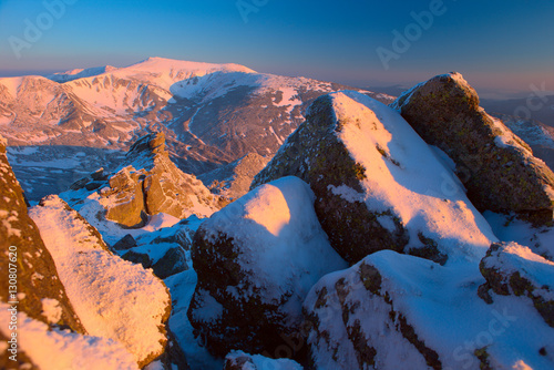 Fototapeta Naklejka Na Ścianę i Meble -  Winter Carpathian mountains; rock and a morning light