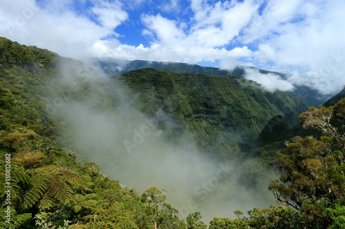 Seen on the Trou de fer waterfall on Reunion Island National Park with cloudscape  France   october 2016  