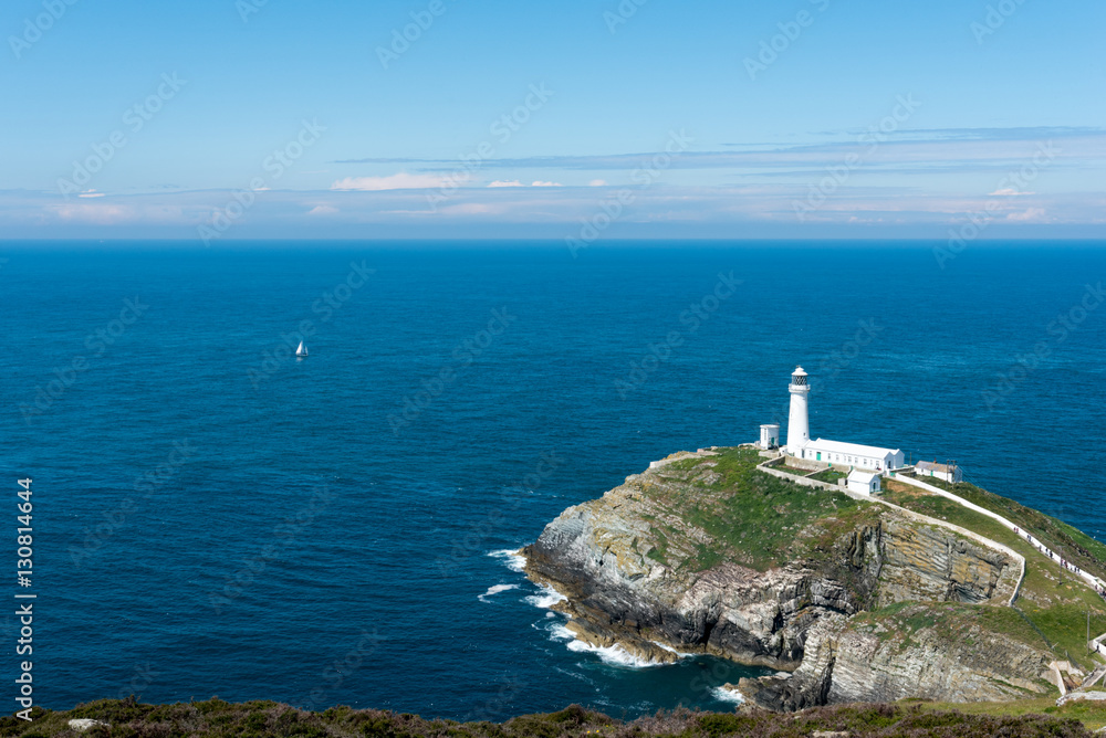 South Stack Lighthouse built on Holy Island in Anglesey Wales built in 1809 is also a nature reserve for birds and wildlife and a popular tourist attraction.