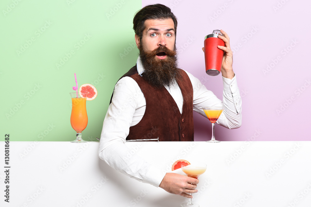 Fototapeta premium surprised handsome bearded barman