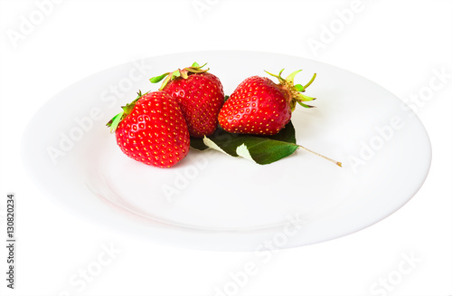 strawberries on a dish isolated white background