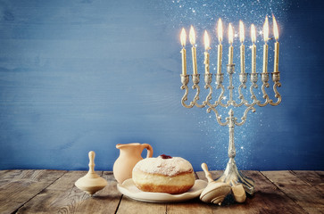 Image of jewish holiday Hanukkah with wooden dreidels