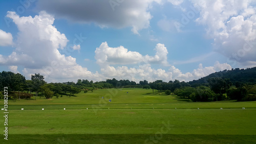 Yard signs in driving range and golf ball with blue sky