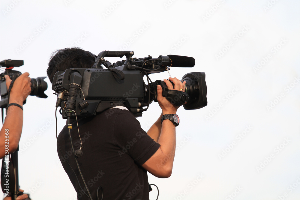 professional cameraman - covering on event with a video - with white background professional cameraman - covering on event with a video - with white background