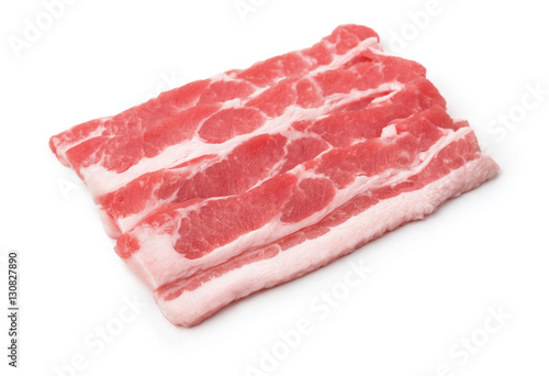 Raw bacon slices isolated on white