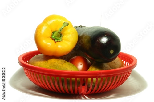 vegetables in a red basket
 photo