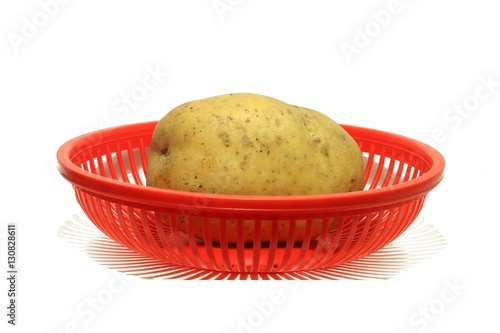 vegetables in a red basket
