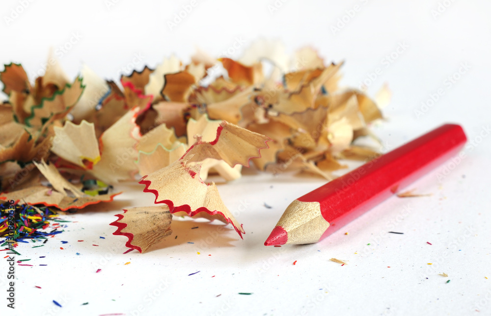 Wooden colorful pencils with sharpening shavings, on wooden table
Wooden colorful pencils with sharpening shavings, on wooden table