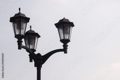 3 ways electric lamp post againt clear blue sky © coolbkk