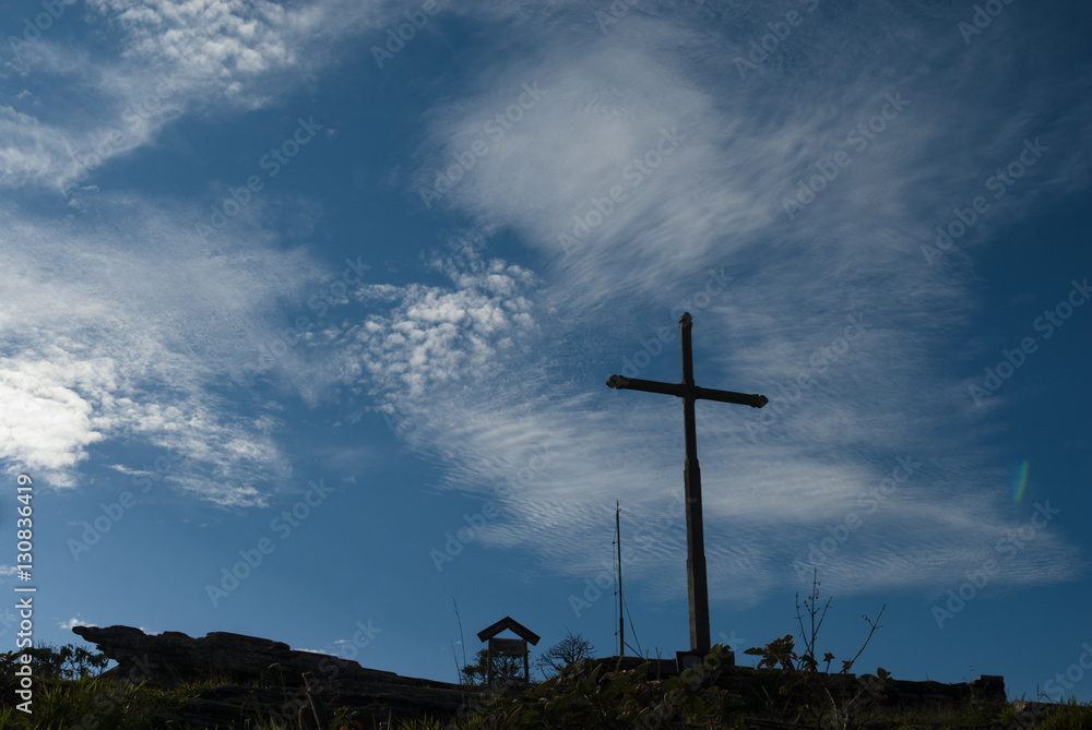 Naklejka premium Cross under blue sky in Brazil