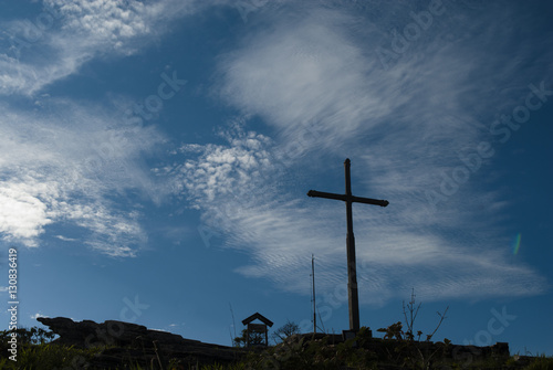 Cross under blue sky in Brazil