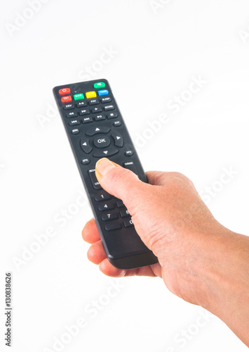 hand holding a remote control