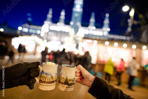 Photography People holding traditional Punch cups in Vienna Christmas Market, December 2016
